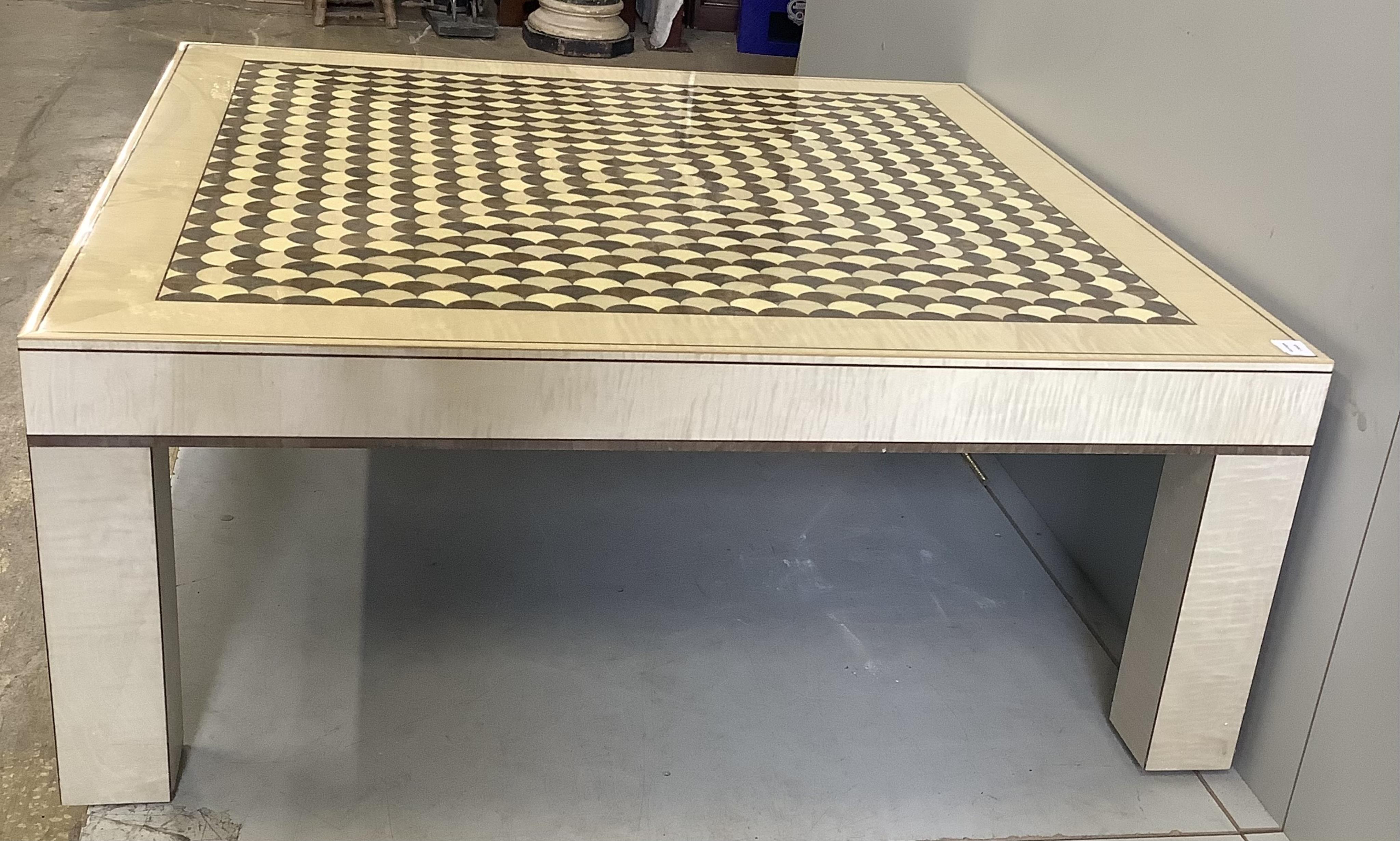A Contemporary Lignae Furniture square sycamore and specimen wood coffee table on square legs, width 122cm, height 48cm